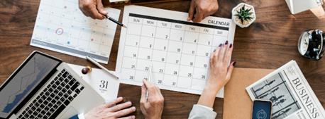 hands-around-calendar